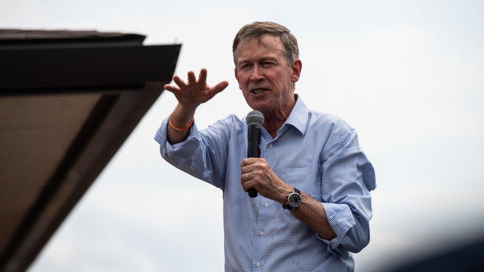 Mr Hickenlooper speaks to voters at the Iowa State Fair in August