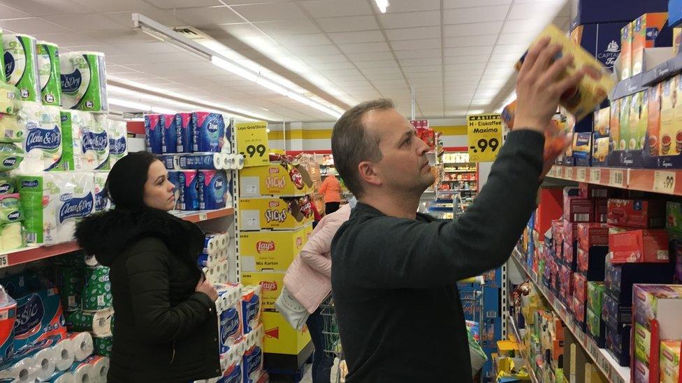 The Zedinek family, from the Czech Republic, shop in Altenberg, Germany