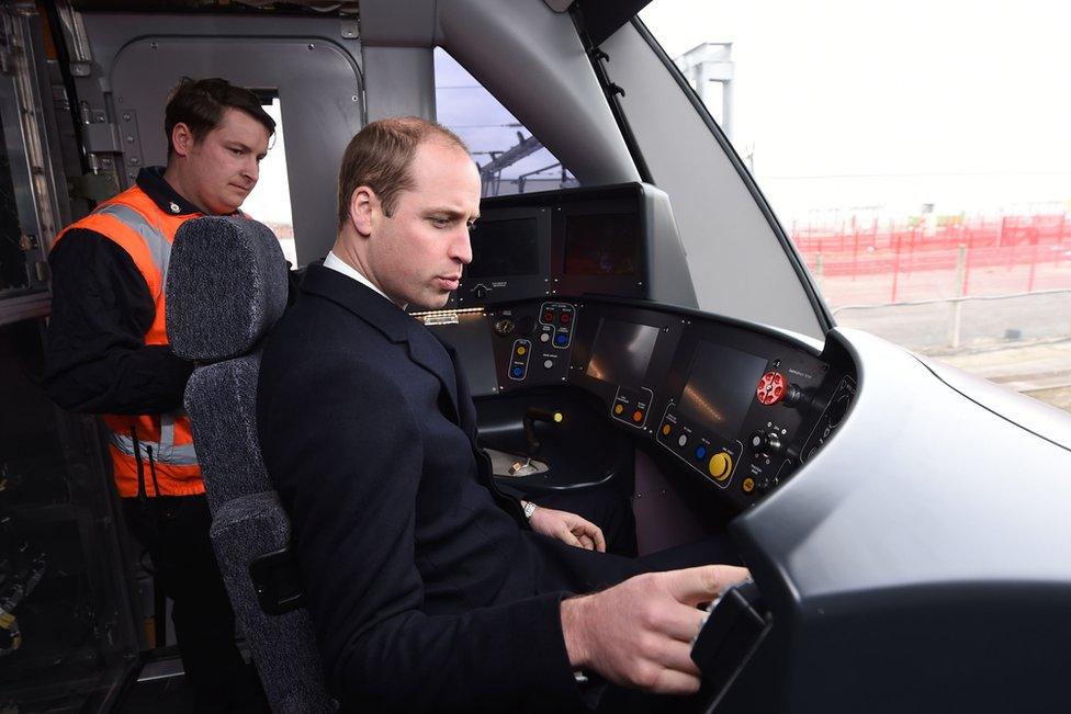 The Duke of Cambridge sounds the warning horn on a Crossrail train, which is destined to run on the Elizabeth Line in London, during a visit to Bombardier Transportation in Derby.