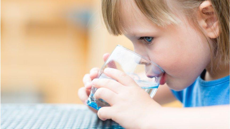 Child drinking water