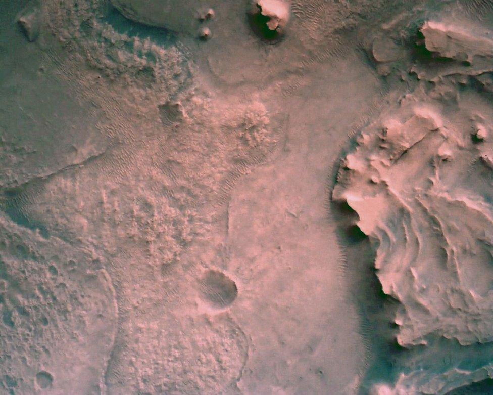 The surface of Mars directly below Nasa's Mars Perseverance rover is seen using the Rover Down-Look Camera