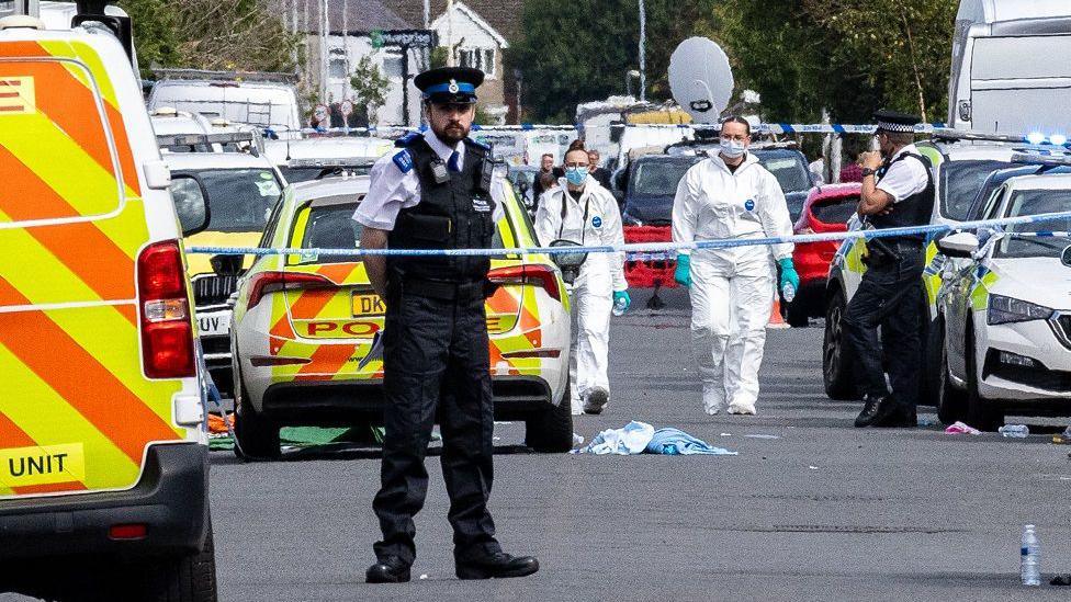 Police and forensics in Hart Street, Southport