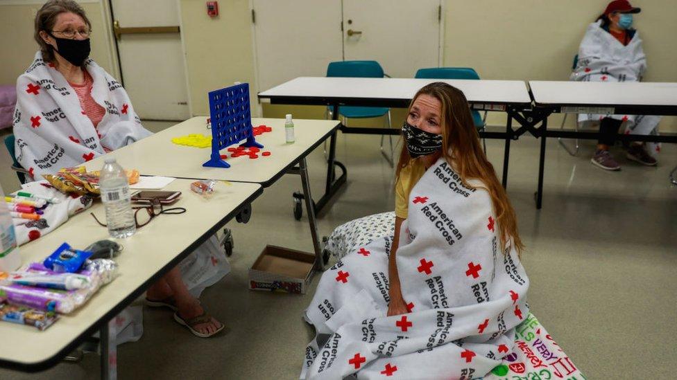 A mother and daughter in an evacuation centre in Vacaville