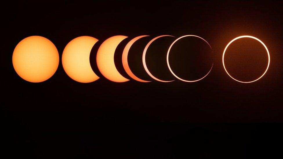 This photo show an annular solar eclipse from start to finish. It's made up of a number of pictures of the Moon from the beginning of the eclipse and continuing all the way until the ring of fire is formed