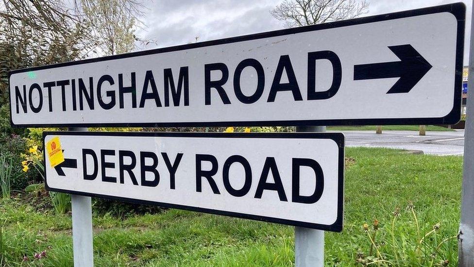 Nottingham Road and Derby Road sign