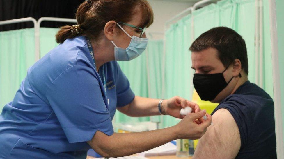 Man being vaccinated