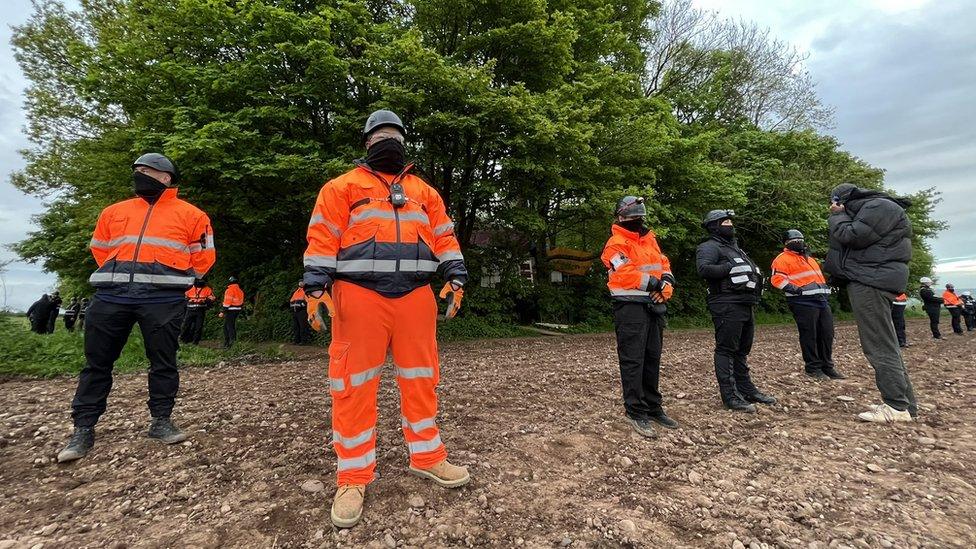 Security staff outside the camp site