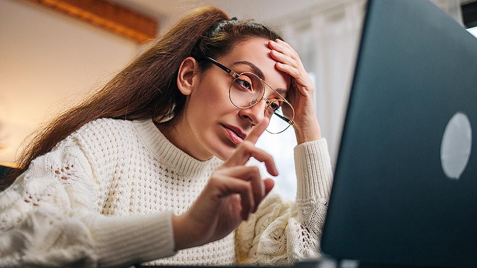 Stressed woman during conference call