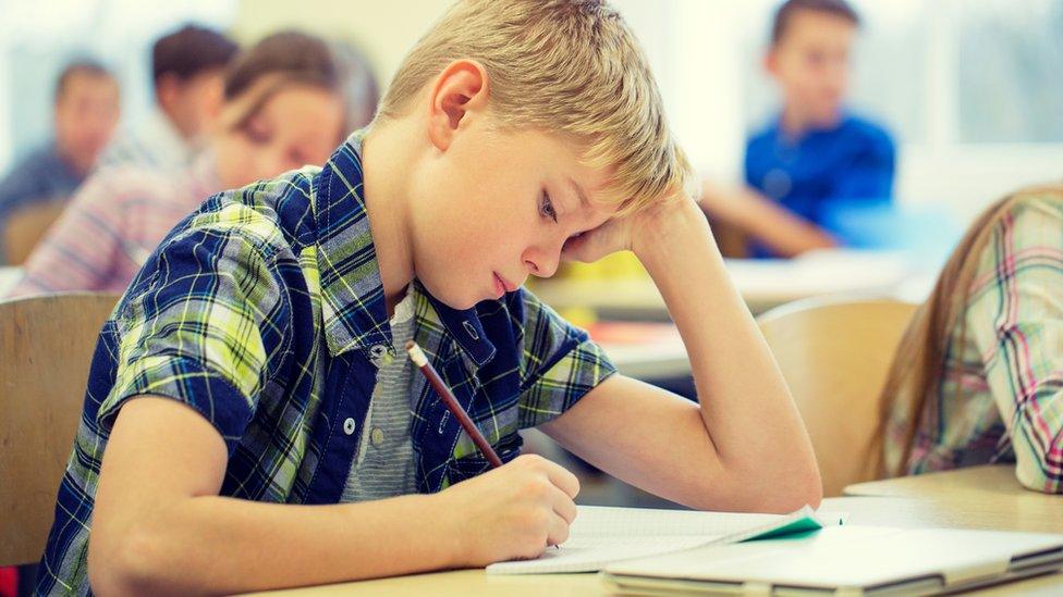 Boy taking a test