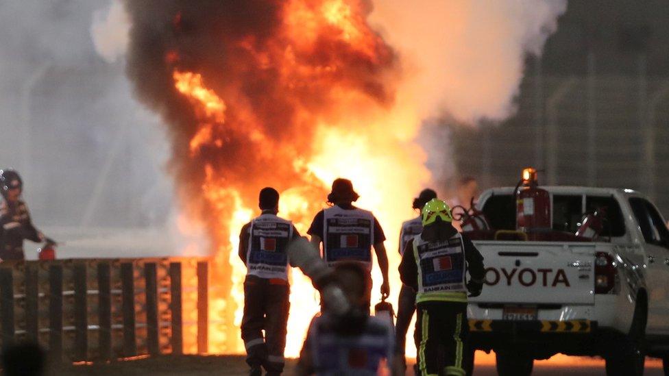 Formula One Car crashes into flames.