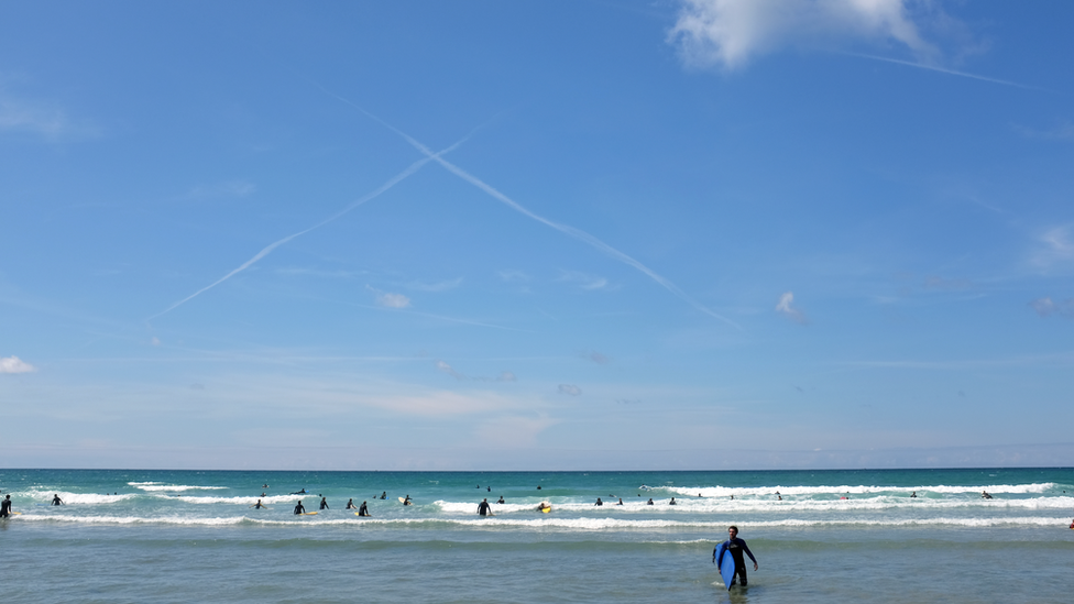 Surfers at Watergate Bay