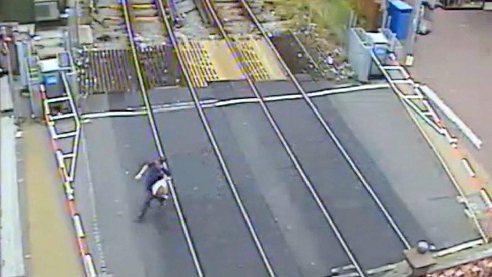 Man on level crossing