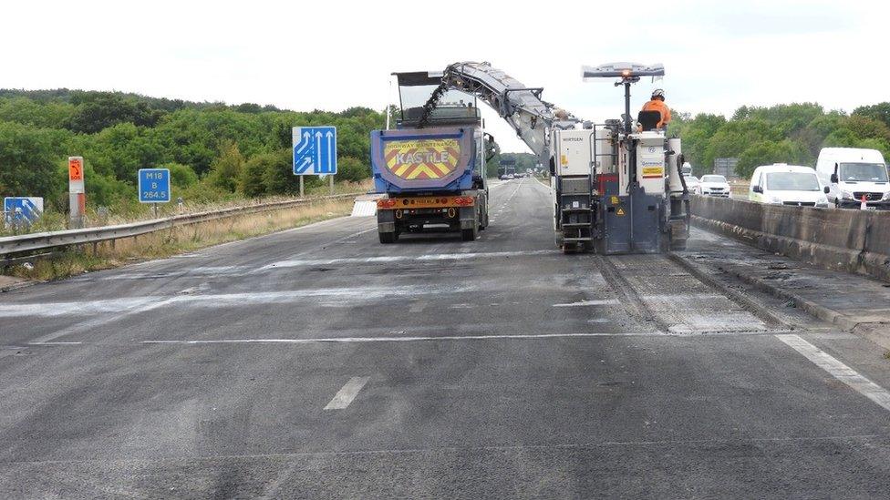 The damaged road surface