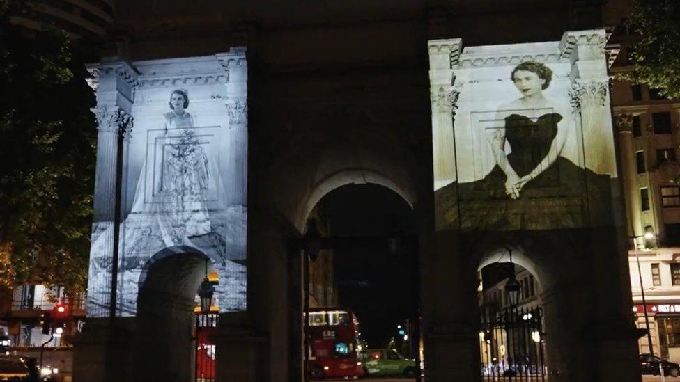 Marble Arch with Queen's portrait.