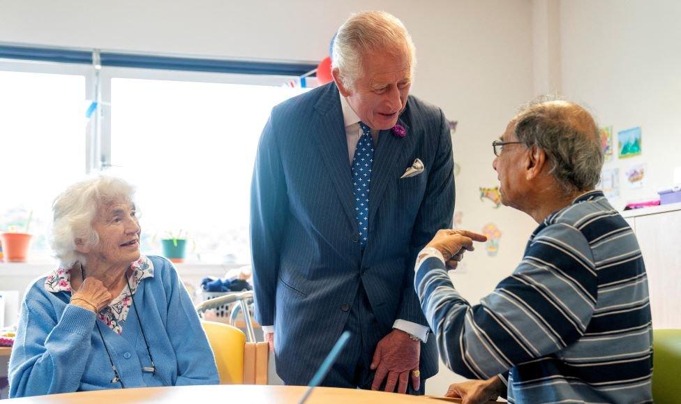 King Charles III speaks with patients during a visit to NHS Lothian's Medicine of the Elderly Meaningful Activity Centre at the Royal Infirmary of Edinburgh