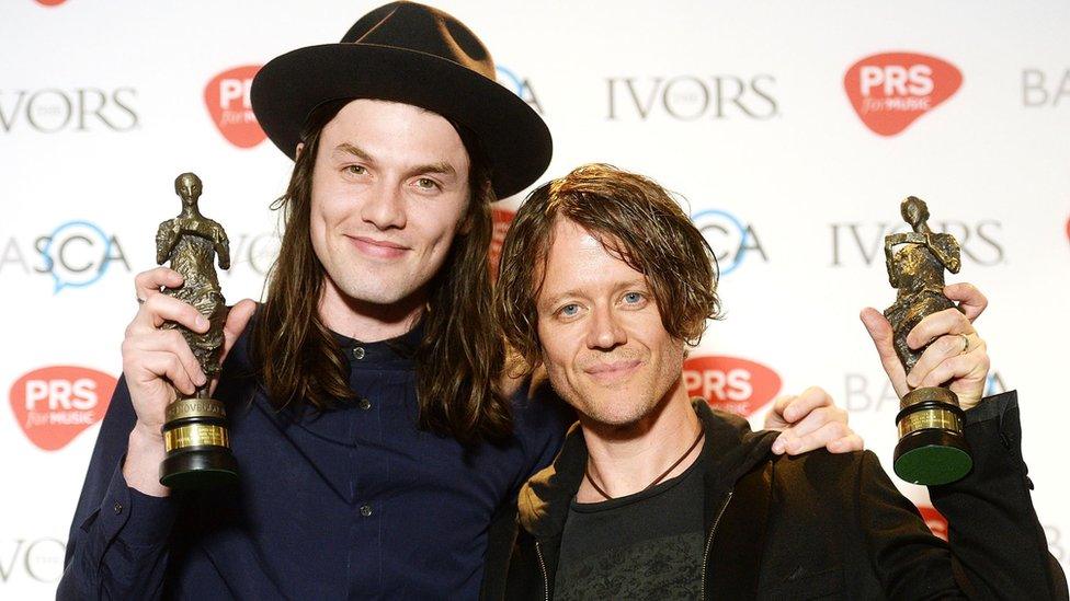 James Bay with Iain Archer after they jointly won a 2016 Ivor Novello award for their song Hold Back The River