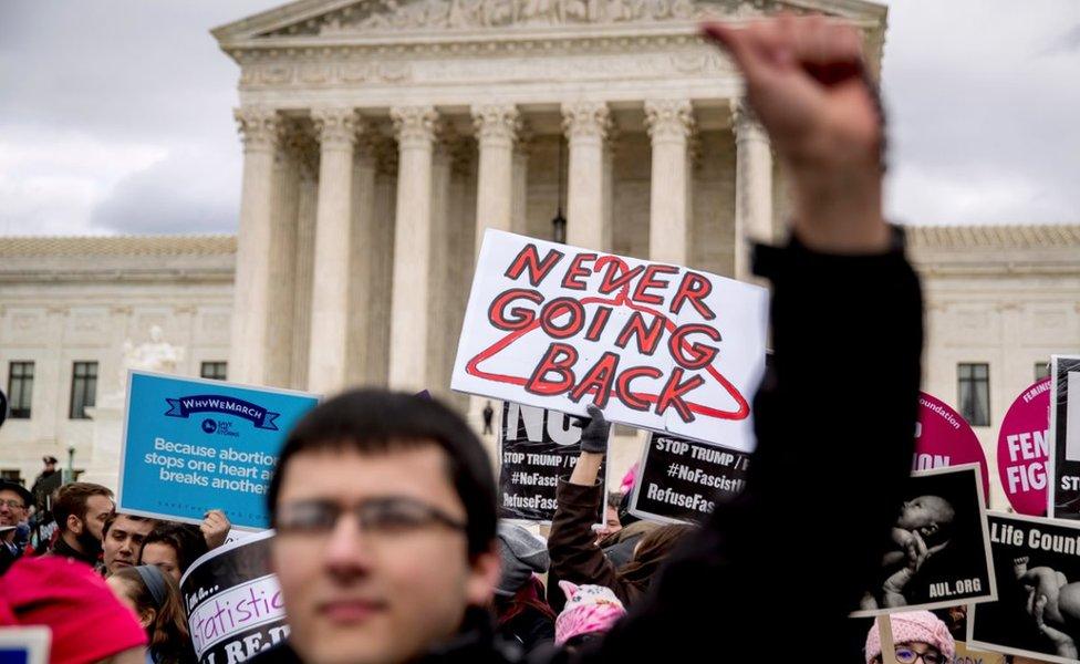 Pro-life and anti-abortion activists converge in front of the Supreme Court in Washington, Friday, Jan. 27, 2017