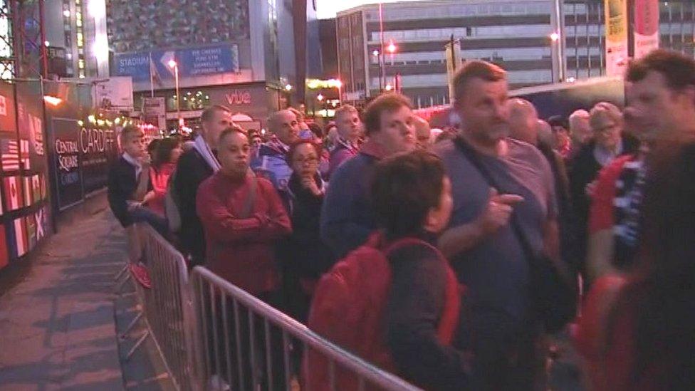 Fans queue after Wales v Fuji on October 1