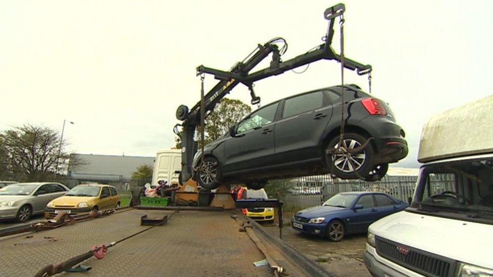 Car being impounded by DVLA in Cardiff