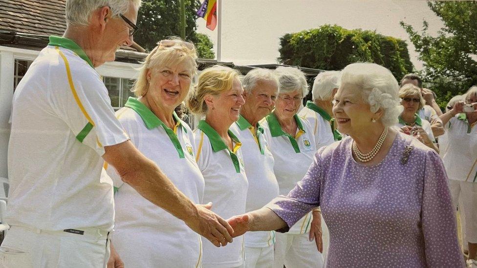 Brimfield bowls club members meeting the Queen