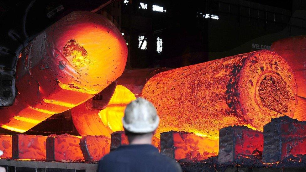 A steel worker at a factory