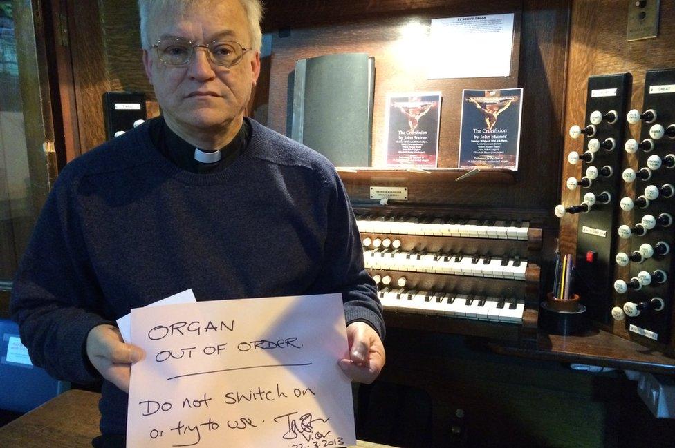 Canon Ian Black and damaged church organ