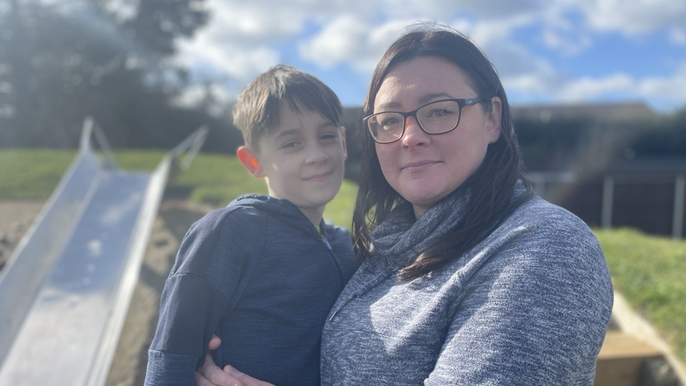 Harleigh, aged nine, with his mum Maddie Roberts