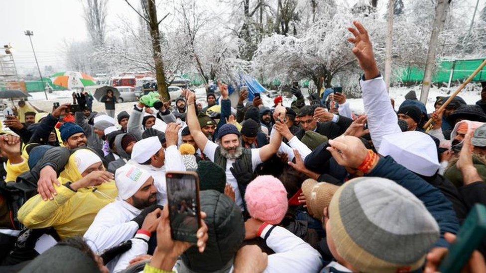 Rahul Gandhi seen with people as snow falls in Srinagar