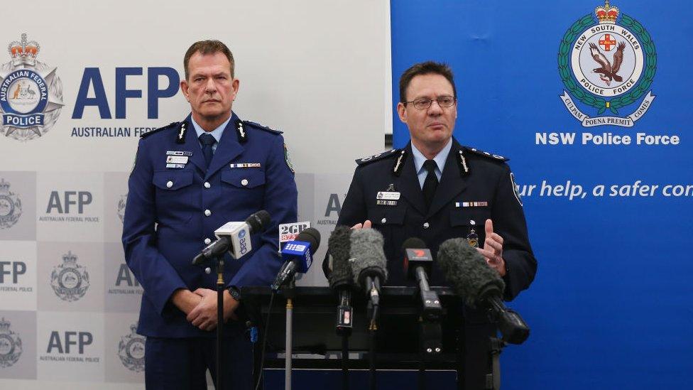 Two Australian police commanders give a press conference on the bomb plot