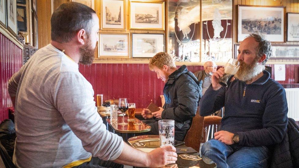 Drinkers in the Scotsman Lounge, Edinburgh