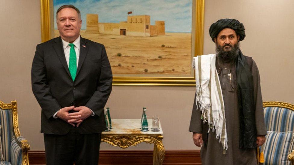 Mike Pompeo and Abdul Ghani Baradar