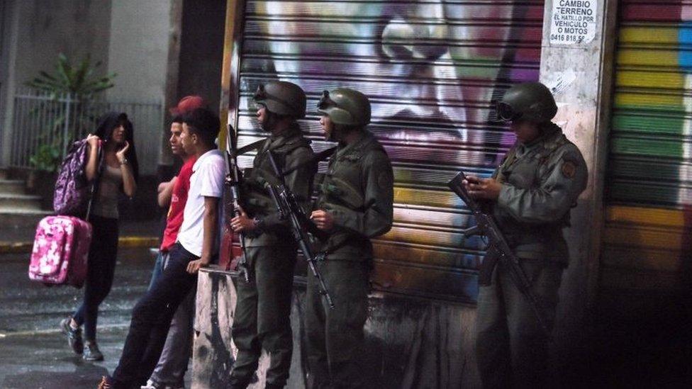 Armed soldiers stand guard in Caracas. Photo: 4 August 2018