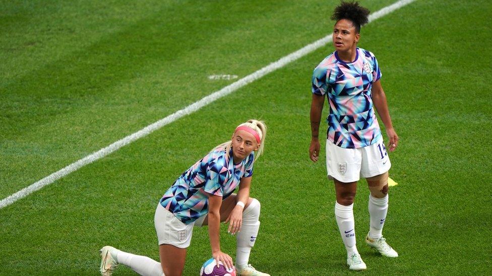 England's Chloe Kelly and Demi Stokes warming up