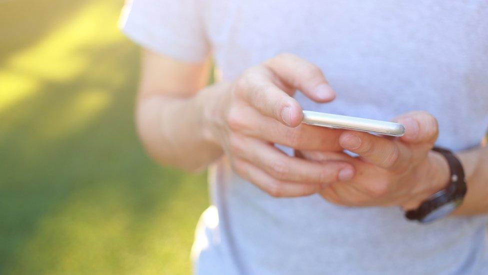 A boy with a smartphone