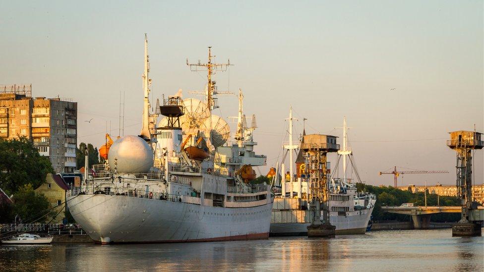 Ships in the river port of Kaliningrad at sunset