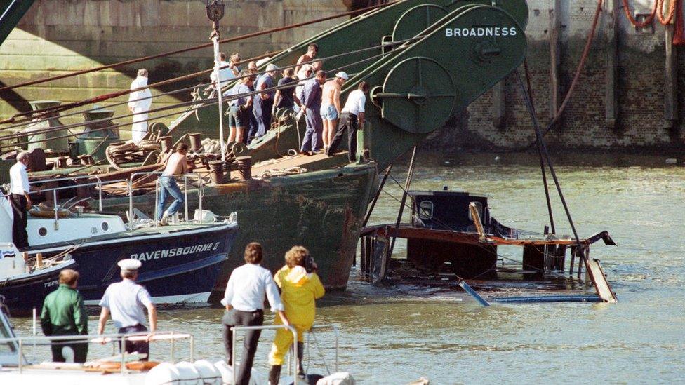 The pleasure boat Marchioness being raised on the River Thames following its sinking in August 1989