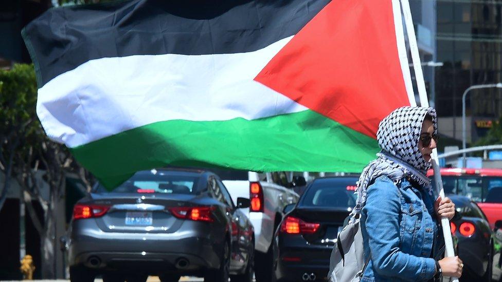 Palestinian-American youth and supporters protest outside the Israeli embassy in Los Angeles.