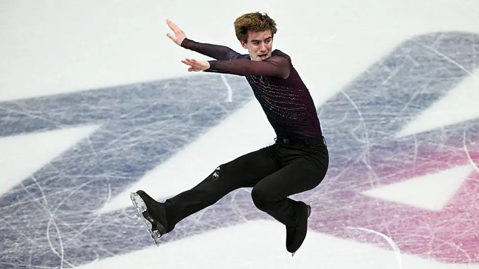 Edward Appleby in action on the ice, with his skates off the ground