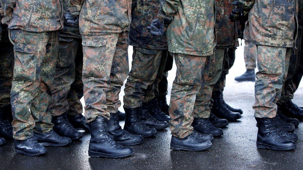 Soldiers of the German armed forces Bundeswehr take part in farewell ceremony for Panzergrenadierbataillon 122, deployment in Lithuania, in Oberviechtach, Germany January 19, 201