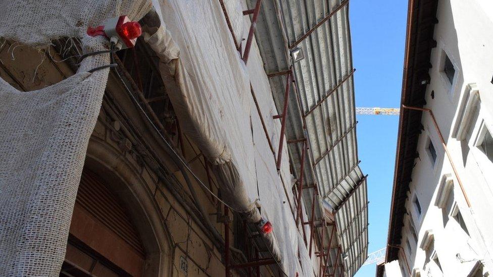 A street under reconstruction in L'Aquila