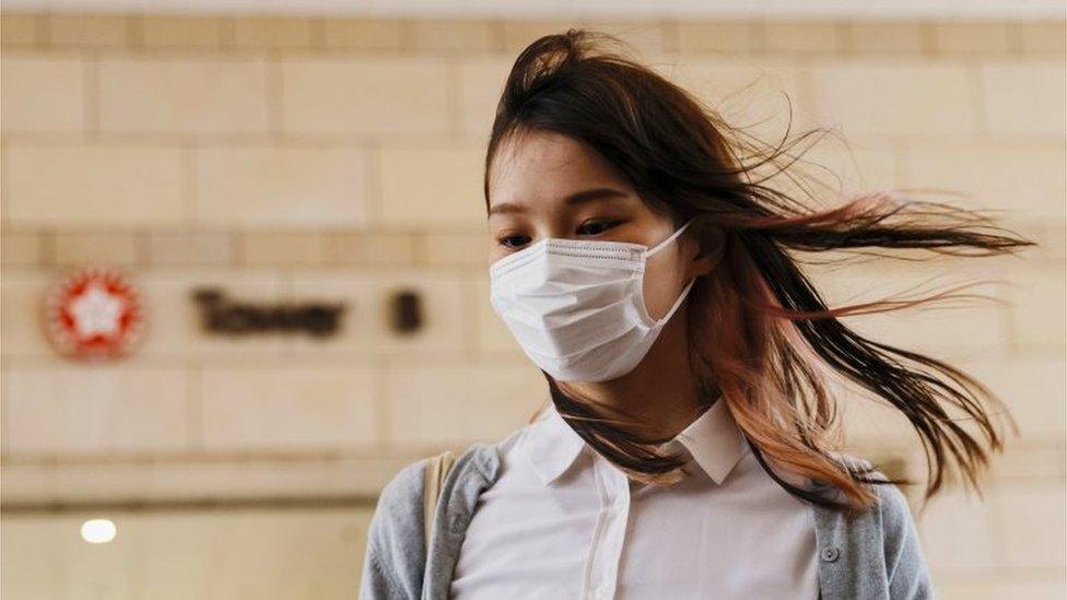 Agnes Chow standing in front of court on 23 November, 2020.