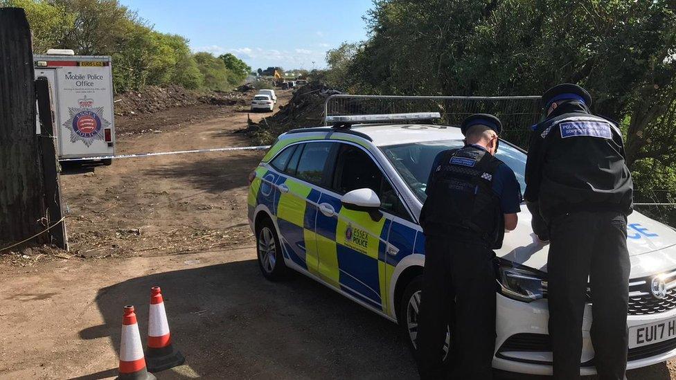 Police at salvage yard