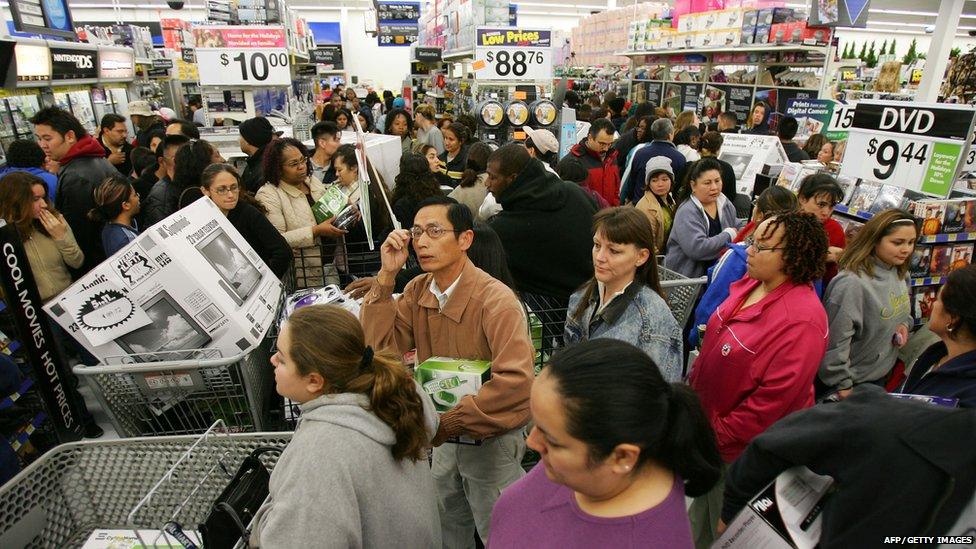 Shoppers queuing in the US