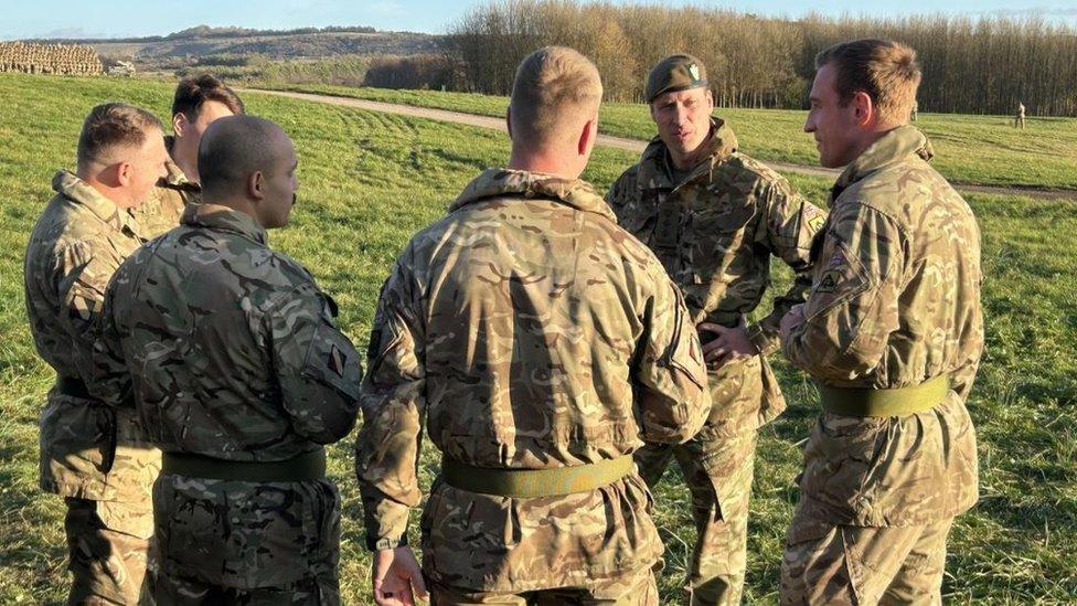 Prince William chatting to members of the Mercian regiment