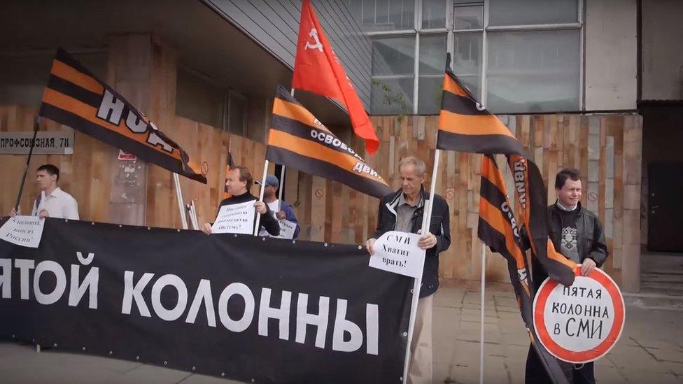 Russian nationalists protest against RBC, 19 June 15 (screengrab from YouTube video)