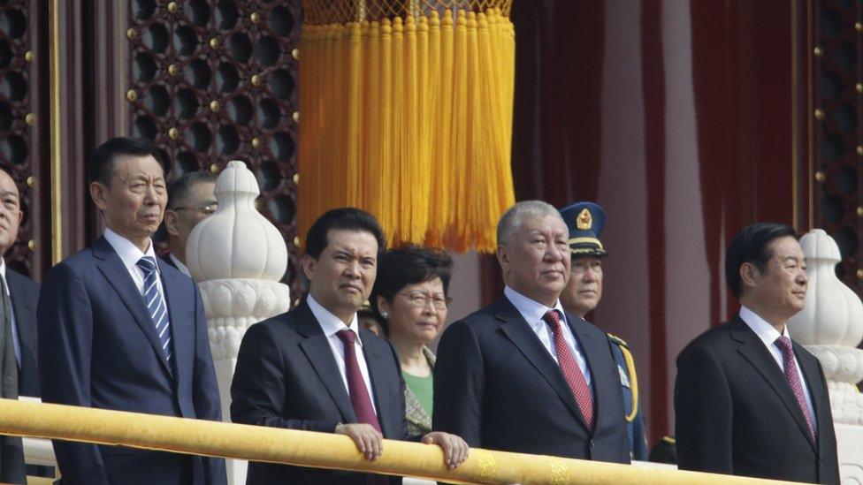 Hong Kong Chief Executive Carrie Lam stands with other Chinese leaders on Tiananmen Gate