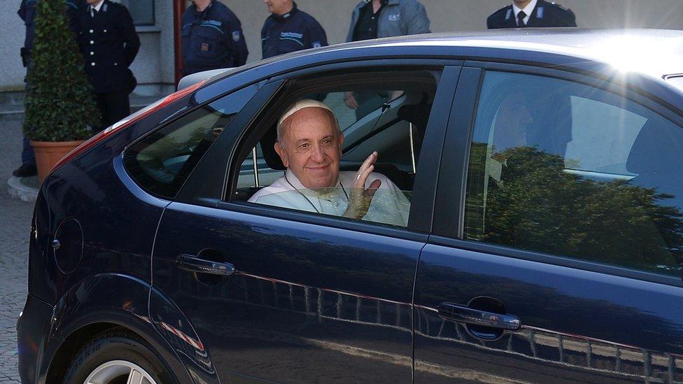 Pope Francis in his Ford Focus