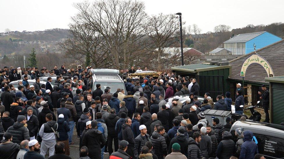 The coffin of Mohammed Yassar Yaqub is carried outside Masjid Bilal Huddersfield