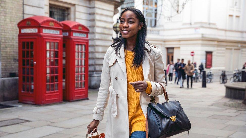 Woman walking on a street in London