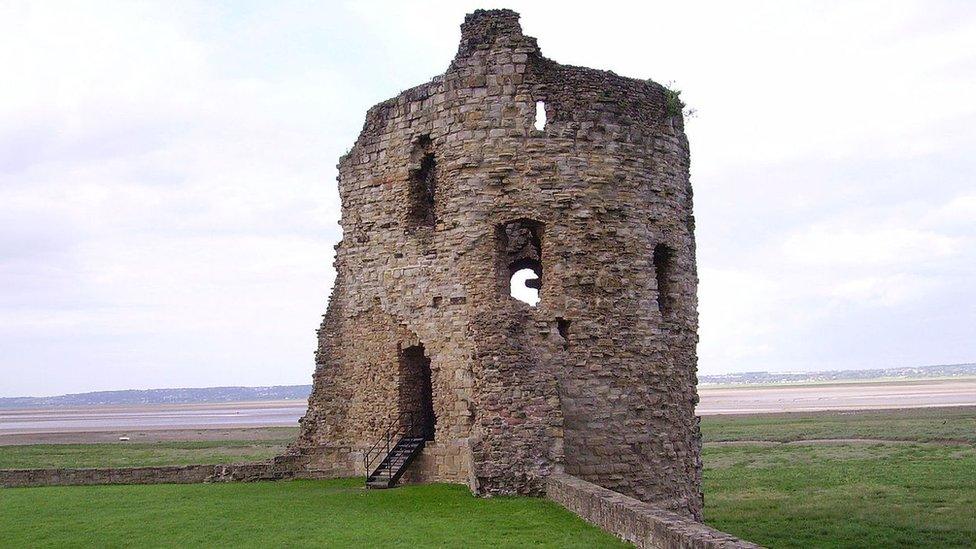 A tower section of Flint Castle overlooking the Dee estuary